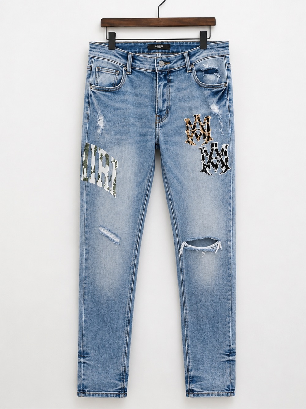 AMIRI Varsity Patch Ripped Skinny Jeans Light Wash Distressed Size 36